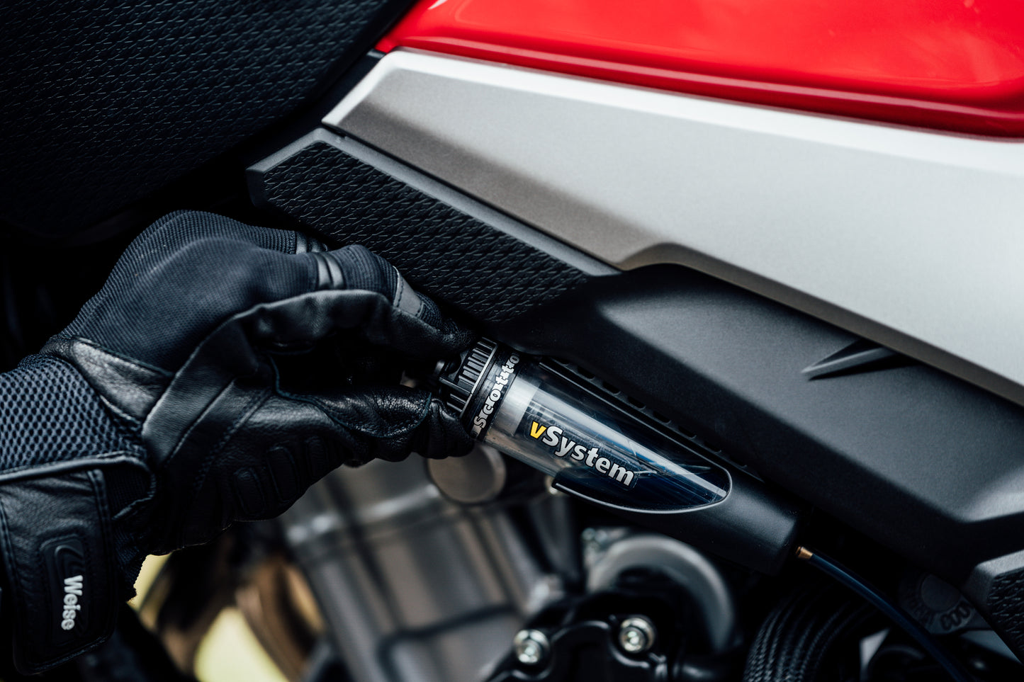 Scottoiler The vSystem automatic motorcycle chain oiler is the original Scottoiler.