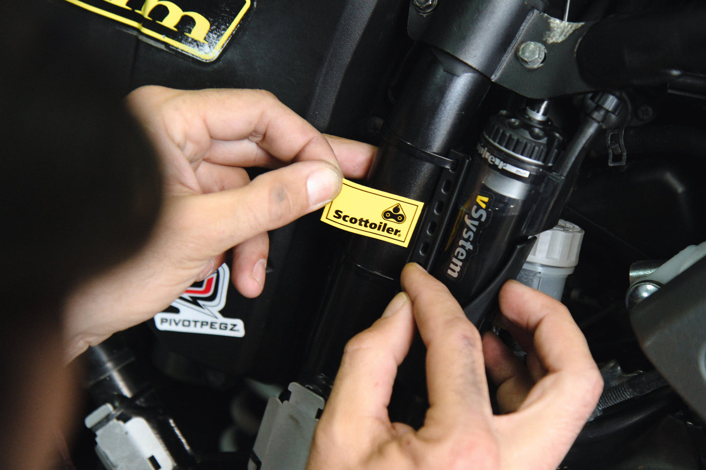 Scottoiler The vSystem automatic motorcycle chain oiler is the original Scottoiler.