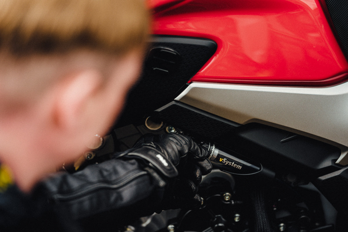 Scottoiler The vSystem automatic motorcycle chain oiler is the original Scottoiler.