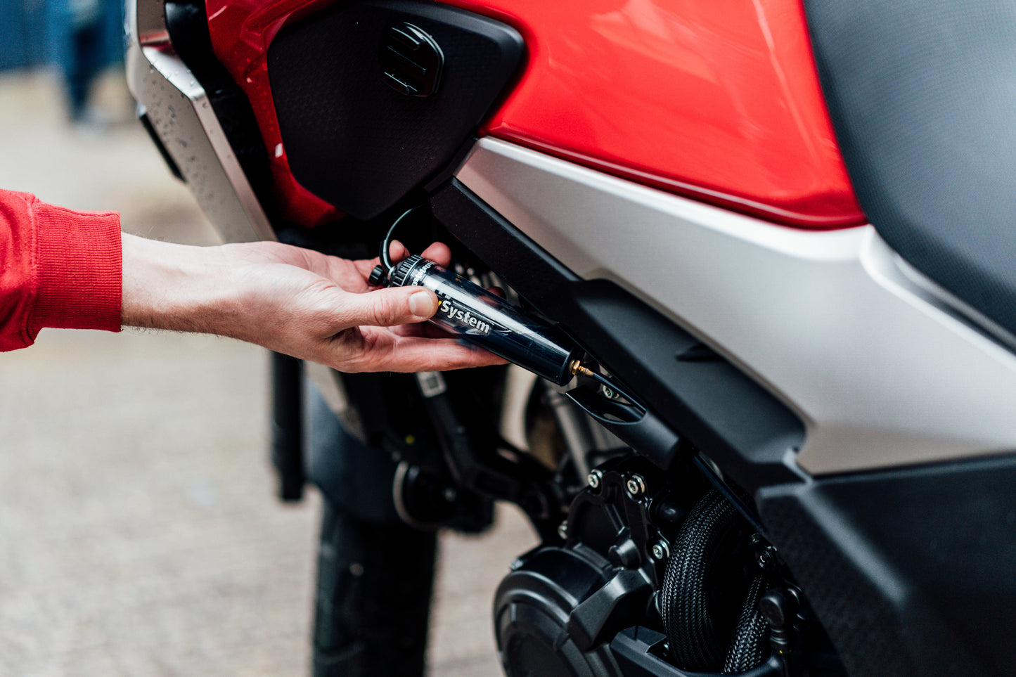 Scottoiler The vSystem automatic motorcycle chain oiler is the original Scottoiler.