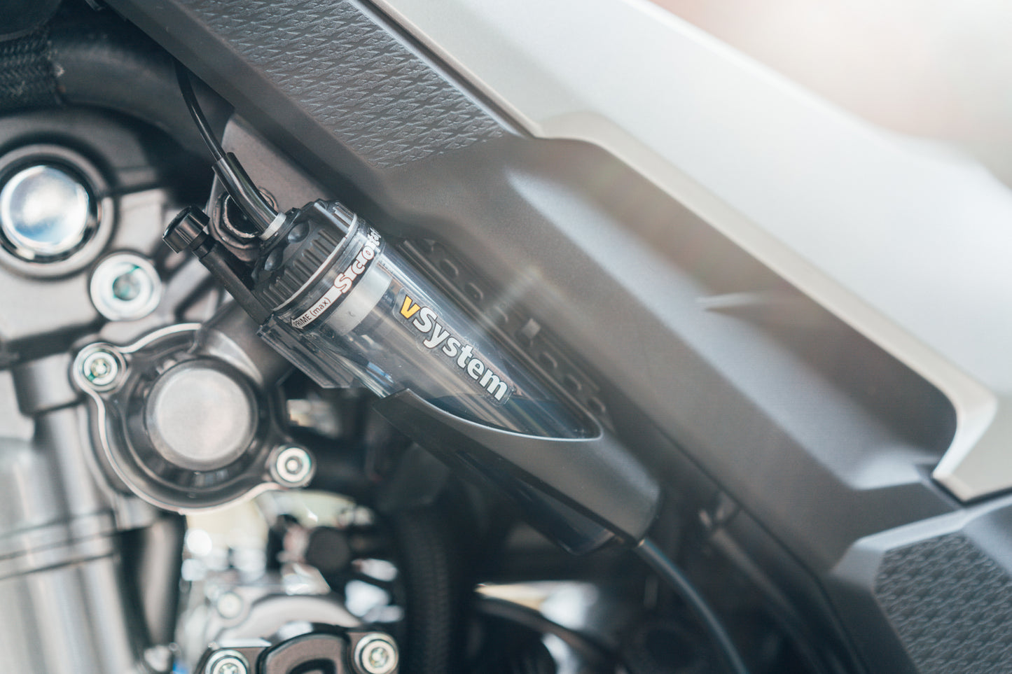 Scottoiler The vSystem automatic motorcycle chain oiler is the original Scottoiler.